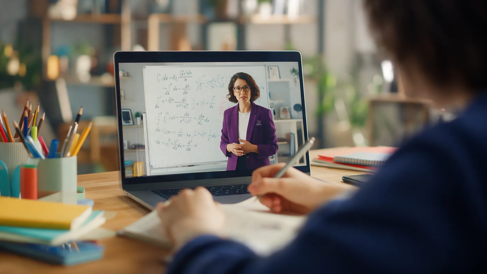 Student following a live Edument online lesson on a laptop