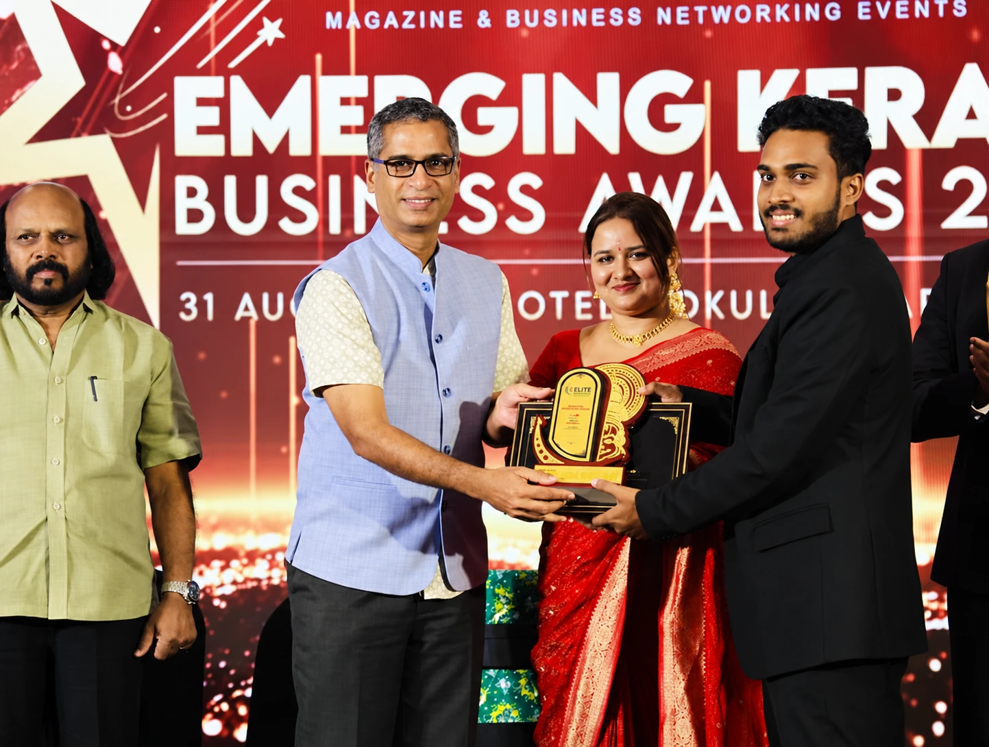 Edument receiving an award at the Emerging Kerala Business Awards ceremony