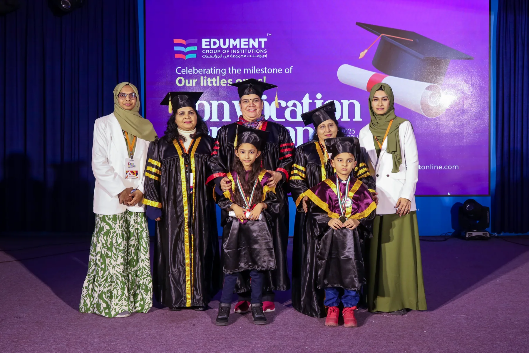 Young graduates with Edument academic staff at a convocation ceremony